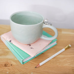 Mint ceramic mug with snow leopard - 450ml