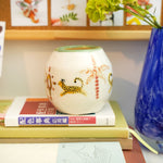 Porcelain vase with leopards
