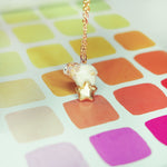 Lion with a star pendant