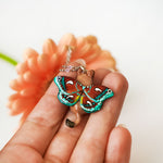 Lioness with moth wings pendant