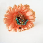Lioness with moth wings pendant