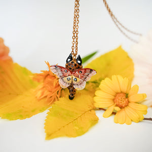 Lynx with moth wings pendant