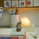 Lynx with barn owls figurine