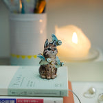 Lynx with barn owls figurine