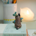 Lynx with barn owls figurine