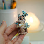 Lynx with barn owls figurine