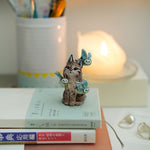 Lynx with barn owls figurine