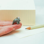 Manatee with the silver Moon pendant