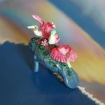 Manatee with roseate spoonbills figurine