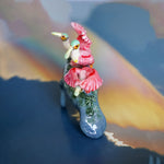 Manatee with roseate spoonbills figurine
