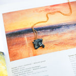 Manta ray with a lace pendant