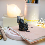 Moon Bear with wolves figurine