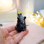 Moon Bear with wolves figurine
