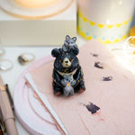 Moon Bear with wolves figurine