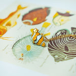 Clown fish with a star pendant