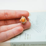 Nemo with a lace pendant