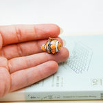 Nemo with a lace pendant