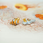 Clown fish with a star pendant