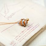 Nemo with a star pendant