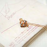 Nemo with a star pendant