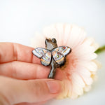 Norwegian forest cat with butterfly wings pendant