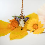 Ocelot with moth wings pendant