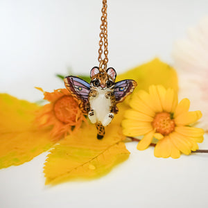 Ocelot with moth wings pendant