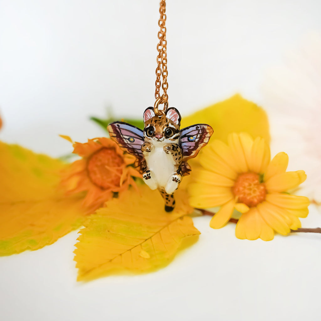 Ocelot with moth wings pendant