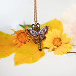 Ocelot with moth wings pendant