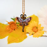 Ocelot with moth wings pendant