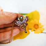 Ocelot with moth wings pendant