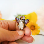 Ocelot with moth wings pendant