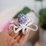 Octopus with blue flowers