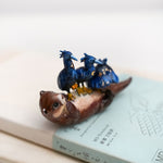 Clawless otter with night herons figurine