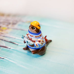 Otter with sea treasures