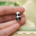 Panda with a gold star pendant