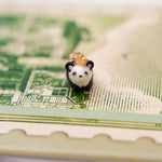 Panda with a gold star pendant