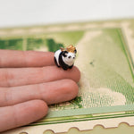 Panda with a gold star pendant