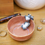 Small porcelain bowl with goofy pandas