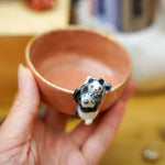 Small porcelain bowl with goofy pandas