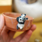 Small porcelain bowl with goofy pandas