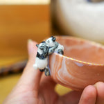 Small porcelain bowl with goofy pandas