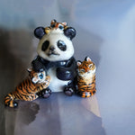 Panda with annoying tigers