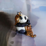 Panda with annoying tigers