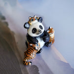 Panda with annoying tigers