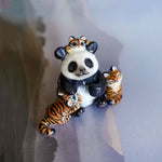 Panda with annoying tigers