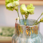 Ceramic vase with two Cockatiels Parrots