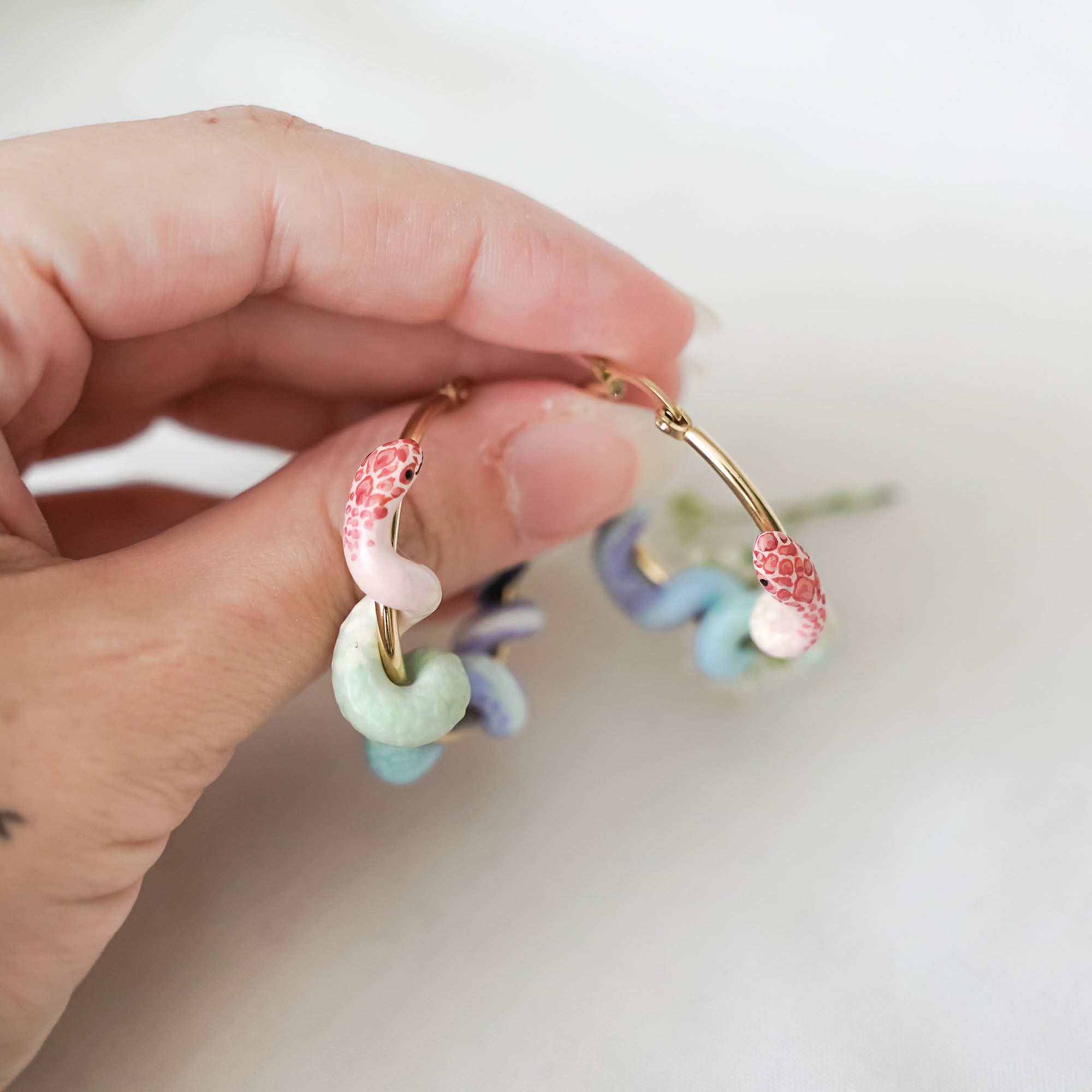 Rainbow pastel snake earrings gold