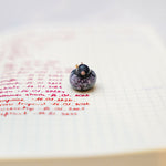 Pigeon with a lace pendant