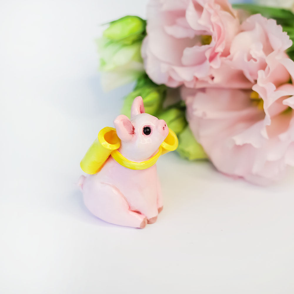 Piggy with a yellow bow